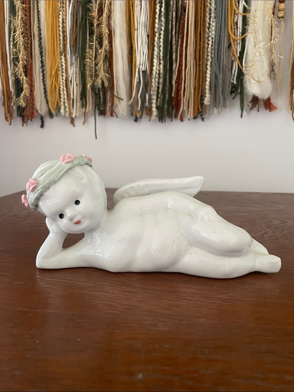 Porcelain Cherub Figurine with Pink Floral Wreath